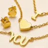 A golden stainless steel heart-shaped necklace with the letter "you" stacked on top, paired with the same style of stud earrings, exudes a gentle, romantic, high-end and niche design Application Scenario